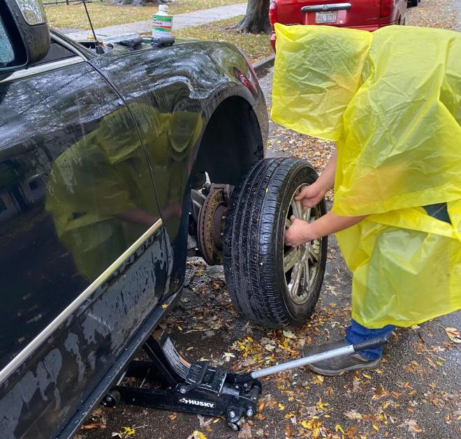 Rick's showing how to change a flat tire - Rick's Emergency Roadside Assistance