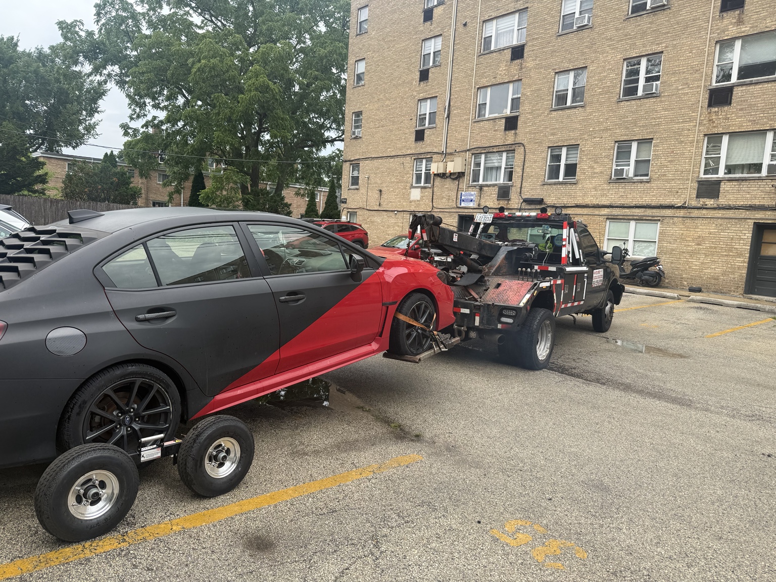 Vehicle being towed after sitting for months with a dead battery and locked ignition interlock device