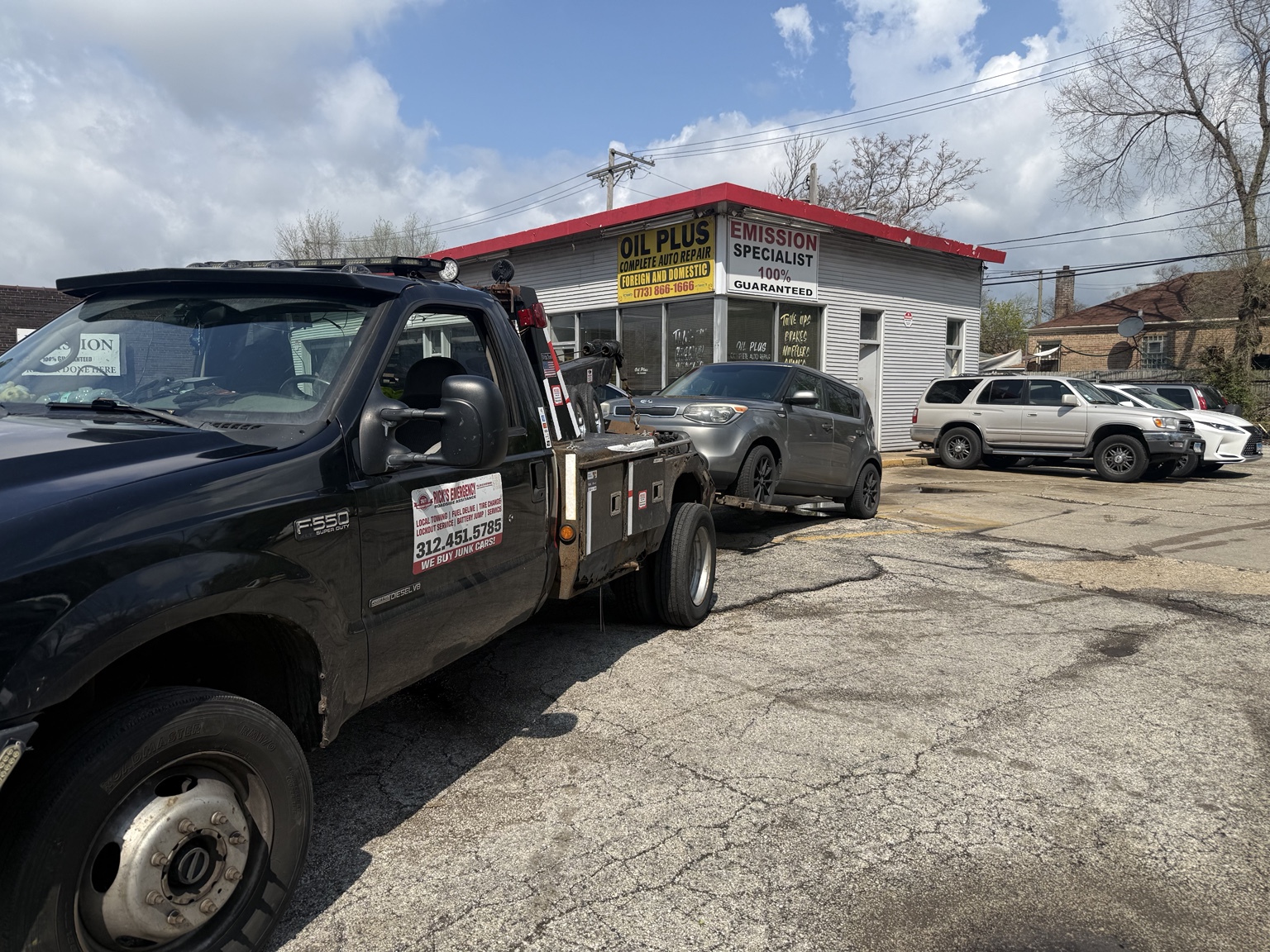 Kia Soul being towed after a locked engine failure on Chicago’s North Side
