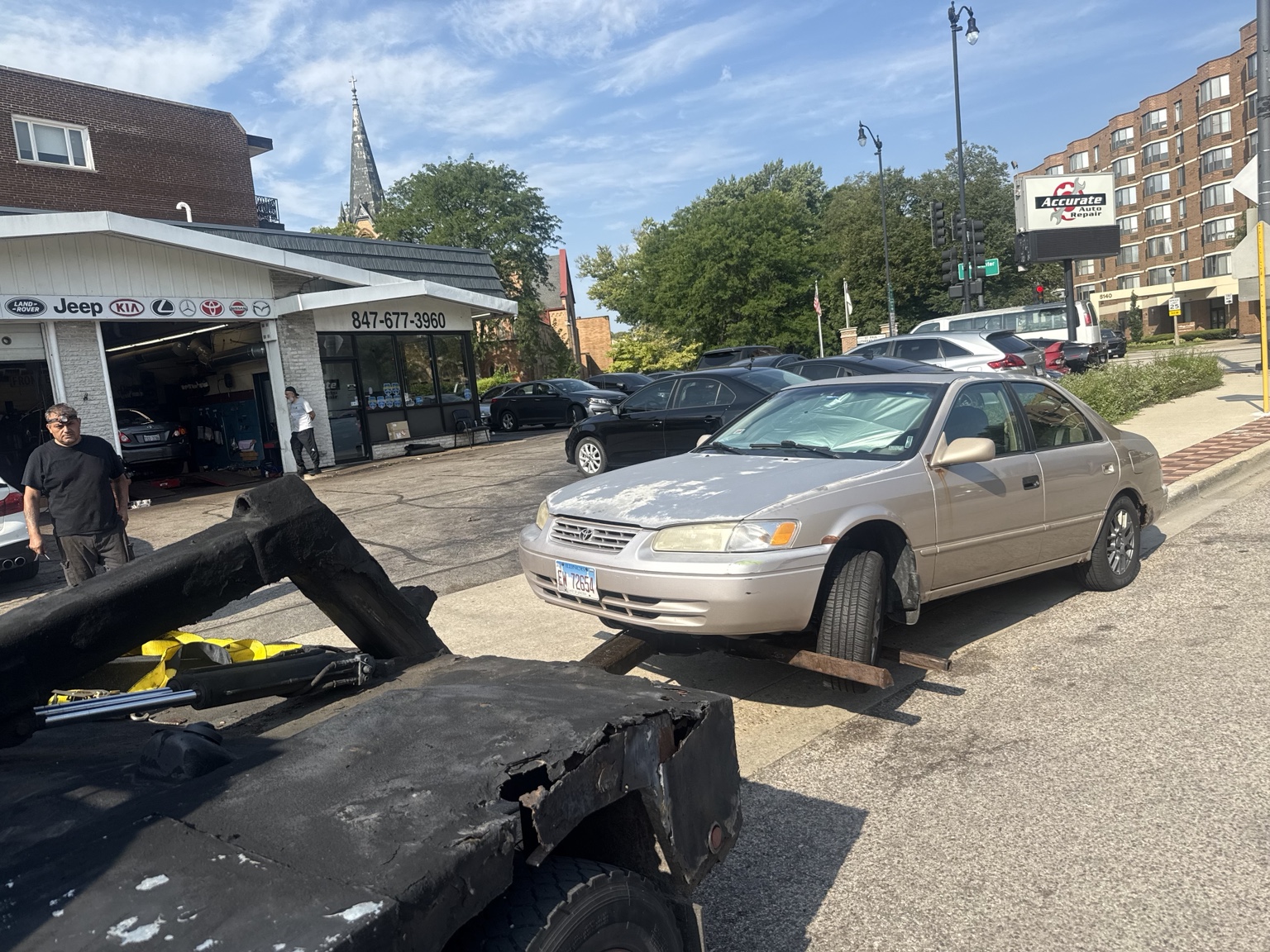 Wheel-lift towing a Toyota Camry in Skokie, Illinois