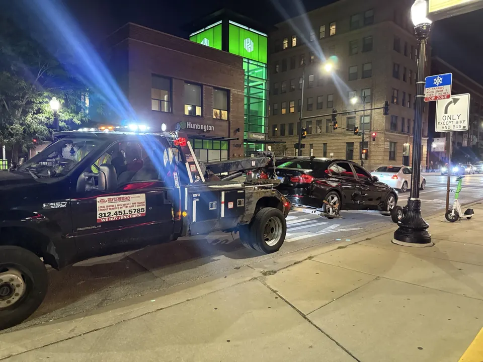 BMW wheel-lift tow near Southport and Fullerton after the vehicle shut off